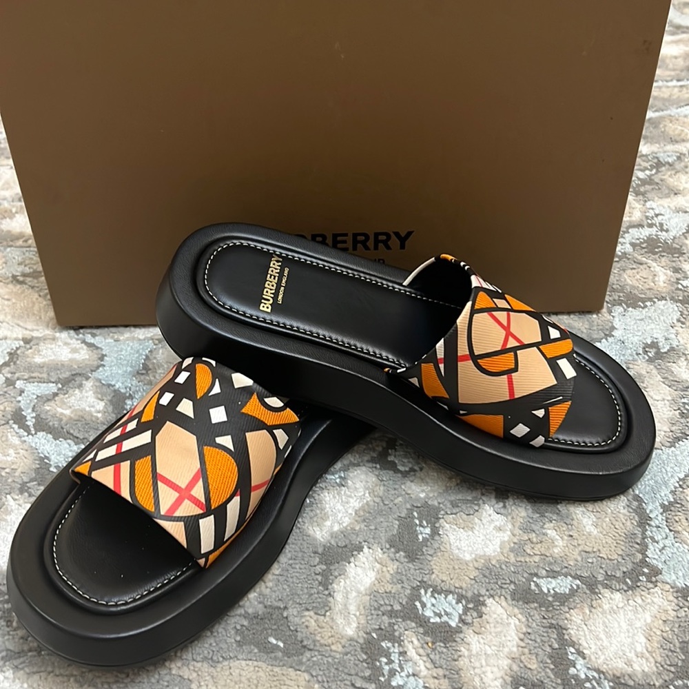 Burberry
Buckingham Monogram Slide Sandals